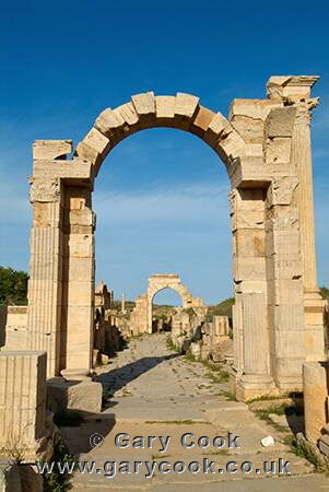 Arch of Trajan and Arch of Tiberius on the Via Trionfale (Cardo), Leptis Magna Roman Ruins, Libya